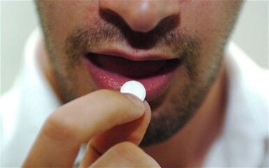a person takes a stimulant pill
